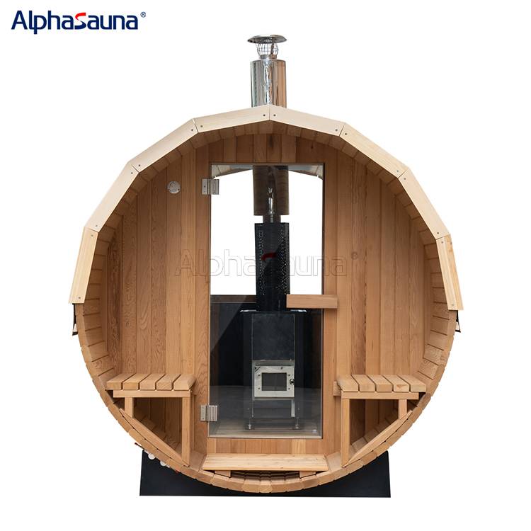 hemlock_outdoor_barrel_sauna_wood_stove_+_asphalt_tiles-alphasauna